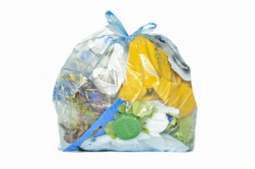 Front view of commercial waste bins on a Crouch End street